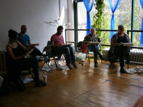 Artists sketch Jillian Page during a Figure Drawing workshop on body acceptance on Oct. 20, 2013. At left in the back, in blue shirt, is Paul Davidson, one of the co-hosts of the event.